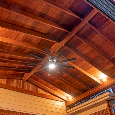 Forever Porch Pavilion (Options: 20' L x 20'-9" W, California Redwood, 2-Post Anchor Kit for High-Wind, No Electrical Wiring Trim, with 2 Fascia Boards for Gutters, 12 ft Posts Height, No Post Decorative Trims, 1 Ceiling Fan Base, No Curtain Rods, with Privacy Panels, Screened Sliding Doors and Fixed Screen Panels, Transparent Premium Sealant). Photo Courtesy of J. Pegg of Cordova, TN.